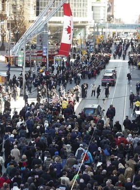 The Ford family follows the funeral procession for former Toronto mayor Rob Ford turns on to Queen St. W. from city hall on Wednesday, March 30, 2016. Jack Boland/Toronto Sun/Postmedia Network)