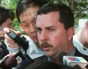 Homicide detective Gary Giroux talks to the media about the murder at 688 Sheppard east, where two Taiwanese girls were attacked and one of them was murdered the night before. Tina Wu was stabbed to death and her sister Teresa badly wounded early Thursday. (Sun Files)