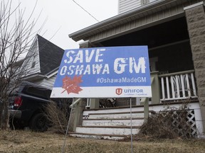 Save GM signs were seen out front of homes in downtown Oshawa on Thursday, March 21, 2019. (Stan Behal/Toronto Sun/Postmedia Network)