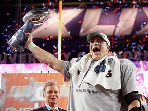 Rob Gronkowski of the New England Patriots celebrates with the Vince Lombardi Trophy after defeating the Seattle Seahawks to win Super Bowl XLIX at University of Phoenix Stadium on February 1, 2015 in Glendale, Arizona. (Christian Petersen/Getty Images)