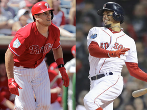 Is J.T. Realmuto left) the new top dog in fantasy catching? Is Mookie Betts the best outfielder? Gary Sanchez and Mike Trout owners might beg to differ. Getty Images photos)
