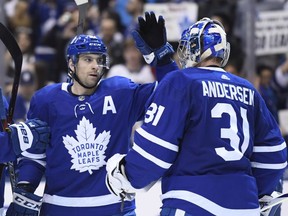 Toronto Maple Leafs centre John Tavares and goaltender Frederik Andersen celebrate thei 7-4 win over the Florida Panthers during NHL hockey action in Toronto on Monday, March 25, 2019. Tavares scored four goals in the win.