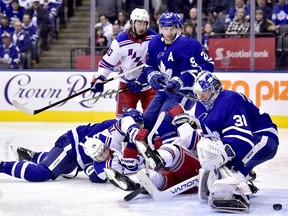 Toronto Maple Leafs goaltender Frederik Andersen fails to stop the puck from going into the net during third period NHL hockey action against the New York Rangers, in Toronto on Saturday, March 23, 2019.