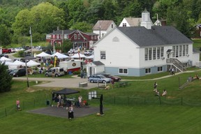 Aerial view of Sugar Hill, N.H. town hall, library and police department, with weekend Lupine Celebration activities on the lawn. (Ian Robertson)