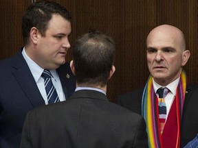 Justice Committee chair Anthony Housefather speaks with Liberal MP Randy Boissonnault, right, and Colin Fraser, left, before a committee meeting in Ottawa, Tuesday March 19, 2019. (THE CANADIAN PRESS/Adrian Wyld)