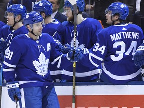 Toronto Maple Leafs centre John Tavares (91) celebrates his fourth goal of the game against the Florida Panthers with teammates including Auston Matthews (34) in Toronto on Monday, March 25, 2019. (THE CANADIAN PRESS/Nathan Denette)