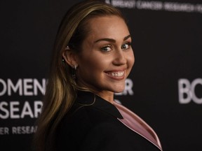 Miley Cyrus attends The Women's Cancer Research Fund's An Unforgettable Evening Benefit Gala at the Beverly Wilshire Four Seasons Hotel in Beverly Hills, Calif., on Feb. 28, 2019.