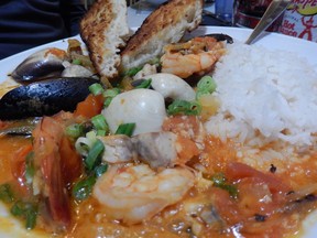 The seafood bog at Jinks Creek in Ocean Isle Beach, N.C. is chock full of fresh clams, shrimp and fish in a rich, seasoned broth. (KEVIN HANN)
