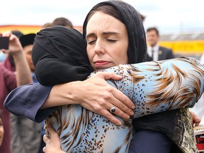 Prime Minister Jacinda Ardern hugs a mosque-goer at the Kilbirnie Mosque on March 17, 2019 in Wellington, New Zealand.