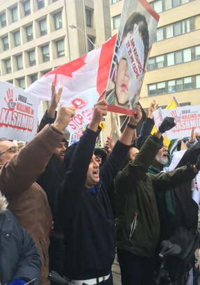 Supporters of Pakistan during a protest out front of the India Consulate at 365 Bloor St. E. in Toronto on Saturday, Feb. 23, 2019. (Joe Warmington/Toronto Sun/Postmedia.com)