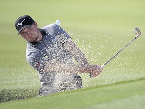 Eddie Pepperell, of England, hits from a bunker onto the first green during the second round of the Arnold Palmer Invitational Friday, March 8, 2019, in Orlando, Fla. (AP Photo/Phelan M. Ebenhack)
