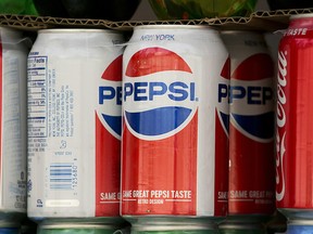 In this May 7, 2018, file photo, cans of Pepsi are displayed in New York. (AP Photo/Mark Lennihan, File)