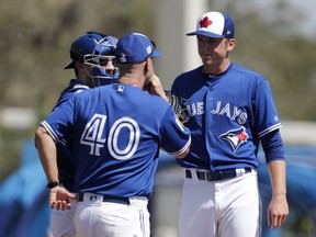 Blue Jays starting pitcher Ryan Borucki (right) was in form for yesterday’s outing against the Philadelphia Phillies. The young lefty allowed just one run on three hits in 4.2 innings, including a strikeout of superstar Bryce Harper.  AP Photo/Lynne Sladky