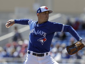 Toronto Blue Jays starting pitcher Aaron Sanchez delivers to the Philadelphia Phillies during the first inning of a spring training baseball game Wednesday, March 6, 2019, in Dunedin, Fla. (AP Photo/Chris O'Meara)