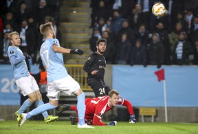 Genk's Alejandro Pozuelo, (back right). Belgian media is reporting that TFC will pay 10 million Euros for the transfer (roughly $15 million) and Pozuelo will make $6 million per season over four years, though TFC officials have said some of the figures coming out of Europe concerning  Pozuelo’s transfer have been exaggerated. AP