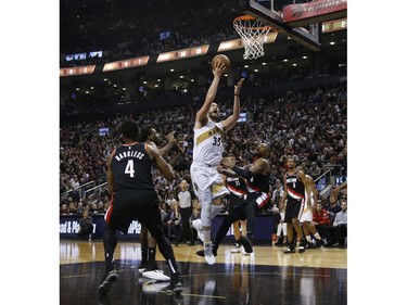Toronto Raptors Marc Gasol C (33) goes tot he rack just before the buzzer and scores In the first half in Toronto, Ont. on Friday March 1, 2019. Jack Boland/Toronto Sun/Postmedia Network