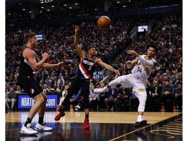 Toronto Raptors Danny Green SG (14) goes around Portland Trail Blazers CJ McCollum SG (3) but gets fouled In the first half in Toronto, Ont. on Friday March 1, 2019. Jack Boland/Toronto Sun/Postmedia Network
