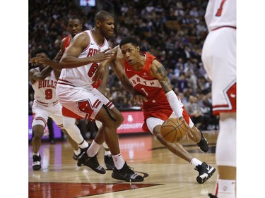 Toronto Raptors Patrick McCaw G (1) drives to the net past  Chicago Bulls Cristiano Felicio PF (6) during the second half in Toronto, Ont. on Tuesday March 26, 2019. Jack Boland/Toronto Sun/Postmedia Network