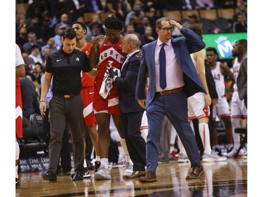 Toronto Raptors OG Anunoby SF (3) is in pain after a collision and went for concussion protocol during the second half in Toronto, Ont. on Tuesday March 26, 2019. Jack Boland/Toronto Sun/Postmedia Network