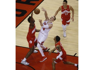 Toronto Raptors OG Anunoby SF (3) blocks Chicago Bulls Lauri Markkanen PF (24) during the second quarter in Toronto, Ont. on Wednesday March 27, 2019. Jack Boland/Toronto Sun/Postmedia Network