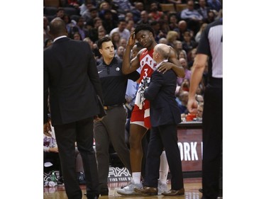 Toronto Raptors OG Anunoby SF (3) is in pain after a collision and went for concussion protocol during the second half in Toronto, Ont. on Tuesday March 26, 2019. Jack Boland/Toronto Sun/Postmedia Network