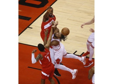 Chicago Bulls Wayne Selden SG (14) is blocked by Toronto Raptors Serge Ibaka C (9) during the second quarter in Toronto, Ont. on Wednesday March 27, 2019. Jack Boland/Toronto Sun/Postmedia Network