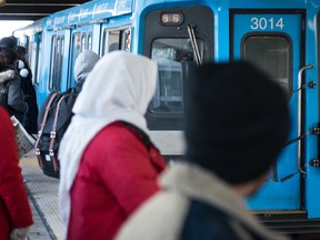 Passengers wait for the SRT to arrive at Scarborough Centre station on March 8, 2019.