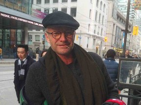 Sting stopped by and pulled on a pair of hockey gloves when struggling Restaurant Row business owners held a street hockey game on King Street in Toronto on Saturday, March 16, 2019. (supplied photo)
