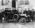 Col. Sam McLaughlin and a few of his senior executives pose for the photographer in front of General Motors of Canada’s headquarters building on William St. in Oshawa. The Colonel sits behind the steering wheel of a 1908 McLaughlin Model F typical of the Canadian company’s first “horseless carriage.” (Oshawa Public Library)