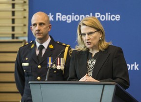 Ontario Minister of Community Safety and Correctional Services Sylvia Jones speaks to media after York Regional Police Deputy Chief Thomas Carrique (left) was named as the new OPP commissioner during a press conference in Aurora on Monday, March 11, 2019. (Ernest Doroszuk/Toronto Sun/Postmedia)