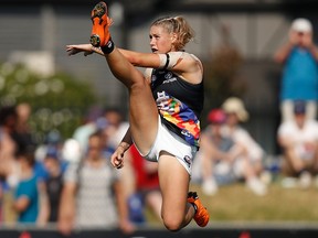 Tayla Harris of the Blues kicks the ball during the 2019 NAB AFLW Round 07 match between the Western Bulldogs and the Carlton Blues at VU Whitten Oval on March 17, 2019 in Melbourne, Australia.