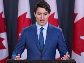 In this file photo taken on March 7, 2019 Canadian Prime Minister Justin Trudeau speaks to the media at the national press gallery in Ottawa, Ontario. (Getty Images)