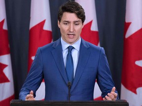 In this file photo taken on March 7, 2019, Prime Minister Justin Trudeau speaks to the media at the national press gallery in Ottawa.