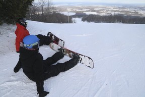 Snowboarders enjoy the view at Blue Mountain. Veronica Henri/Toronto Sun