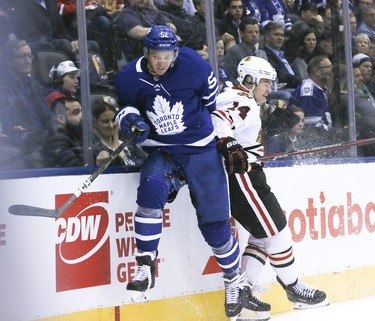 Toronto Maple Leafs defenseman Martin Marincin (52) and Chicago Blackhawks left wing Chris Kunitz (14)on Wednesday March 13, 2019. The Toronto Maple Leafs host the Chicago Blackhawks at the Scotiabank Arena in Toronto. Veronica Henri/Toronto Sun/Postmedia Network