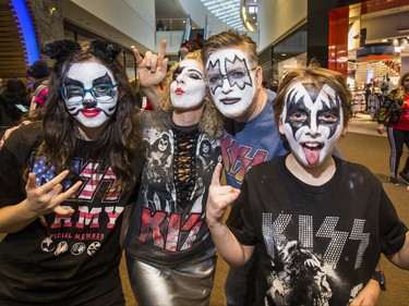 Tim Jones and his wife Jen, with their kids, Elizabeth, 14 and Andrew, 11, from Sackville, New Brunswick, ahead of the Kiss concert during a pre-show party at RealSports Bar & Grill in Toronto, Ont. on Wednesday March 20, 2019. Ernest Doroszuk/Toronto Sun/Postmedia