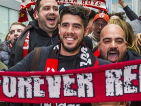 New TFC midfielder Alejandro Pozuelo poses with chanting fans after arriving at Terminal 1 at Toronto Pearson International Airport on Friday March 22, 2019. Ernest Doroszuk/Toronto Sun/Postmedia