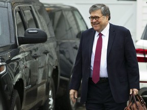 Attorney General William Barr leaves his home in McLean, Va., on Thursday, March 21, 2019.