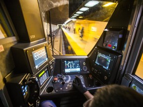 TTC subway operator Gus Tzirivilas sits at the controls of a subway train on Friday, Nov. 3, 2017.