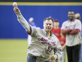 John Wetteland, 52, throws out the first pitch before a spring training baseball game between the Toronto Blue Jays and St. Louis Cardinals in 2018.
