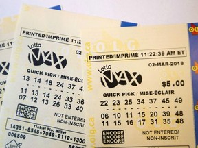 A lotto Max ticket is shown in Toronto on Monday Feb. 26, 2018.