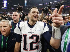 Tom Brady #12 of the New England Patriots celebrates after the Patriots defeat the Los Angeles Rams 13-3 during Super Bowl LIII at Mercedes-Benz Stadium on February 3, 2019 in Atlanta, Georgia.