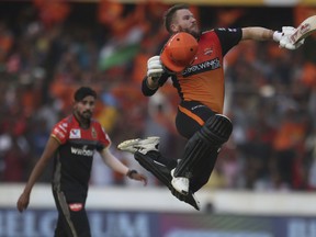 Sunrisers Hyderabad's David Warner celebrates after scoring hundred runs against Royal Challengers Bangalore on the weekend. (AP PHOTO)