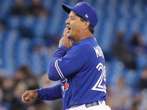 Jays manager Charlie Montoyo will face fellow Puerto Rican Alex Cora, manager of the Red Sox, this week in Boston. (GETTY IMAGES)