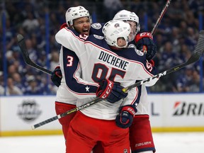 Columbus Blue Jackets Seth Jones, left, celebrates his goal with Matt Duchene during the third period against the Tampa Bay Lightning in Game One of the Eastern Conference First Round during the 2019 NHL Stanley Cup Playoffs at Amalie Arena on April 10, 2019 in Tampa, Florida. (Mike Carlson/Getty Images)
