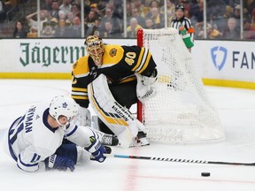 Zach Hyman of the Toronto Maple Leafs slides after attempting a shot against Tuukka Rask  of the Boston Bruins during the second period of Game Five of the Eastern Conference First Round during the 2019 NHL Stanley Cup Playoffs at TD Garden on April 19, 2019 in Boston, Massachusetts.