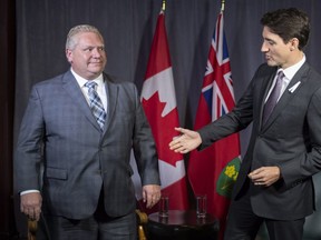 Prime Minister Justin Trudeau meets with Ontario Premier Doug Ford in Montreal on Thursday, December 6, 2018.