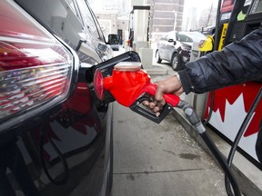 The federal Liberal carbon tax is driving up gas prices.  (Stan Behal, Toronto Sun)