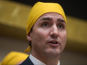 Prime Minister Justin Trudeau addresses the crowd at the Khalsa Diwan Society Sikh Temple before marching in the Vaisakhi parade, in Vancouver on Saturday April 13, 2019. (The Canadian Press)