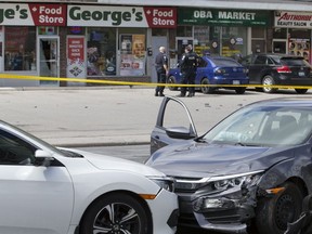 Police are pictured investigating a shoooting on Jane St. on April 9, 2019. (Craig Robertson, Toronto Sun)